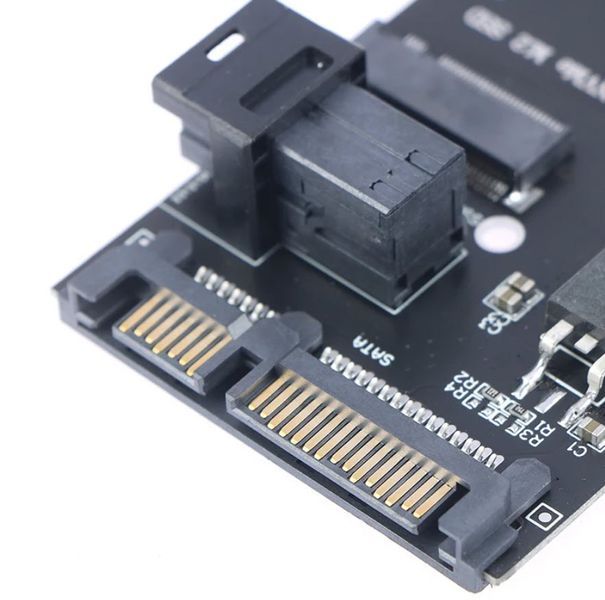 Адаптер Slimline SFF-8643 на M.2 U.2 Kit (NGFF M-Key) для NVMe PCIe та SATA SSD Адаптер є ідеальним рішенням для розширення можливостей зберігання даних на вашій материнській платі, що дозволяє підключати сучасні високошвидкісні твердотільні накопичувачі  8156 фото