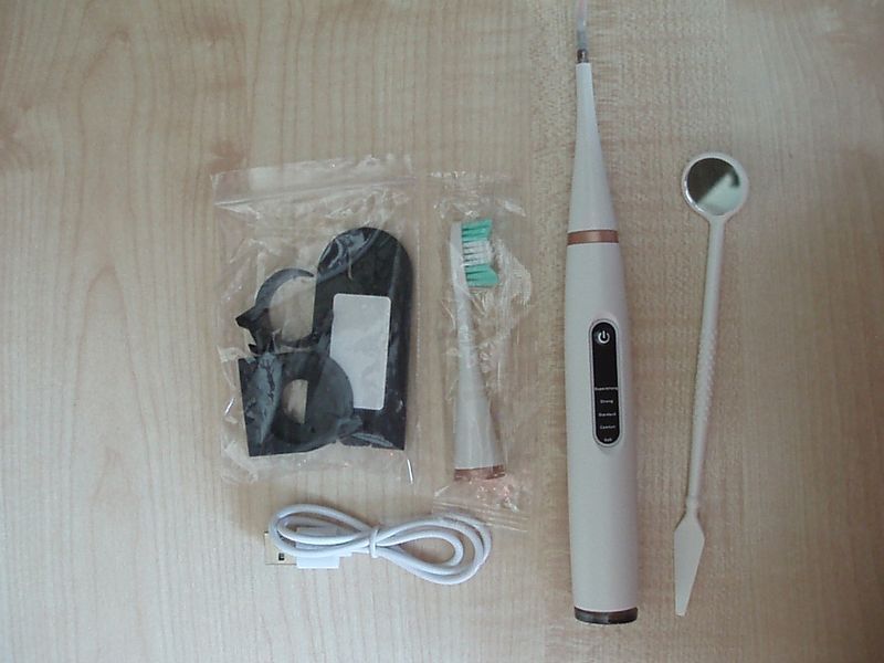 Электрический ирригатор для полости рта с USB зарядкой и множеством режимов работы 7845 фото