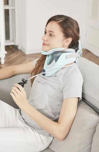 E-03 Cervical Traction Device Бандаж корсет комір для шийного відділу з фіксацією підборіддя Air sac Adjusta 8007 фото