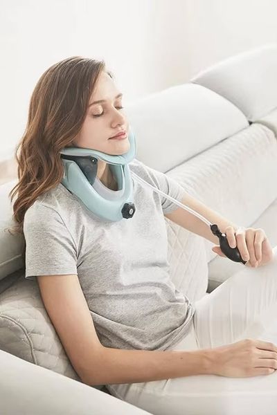 E-03 Cervical Traction Device Бандаж корсет комір для шийного відділу з фіксацією підборіддя Air sac Adjusta 8007 фото