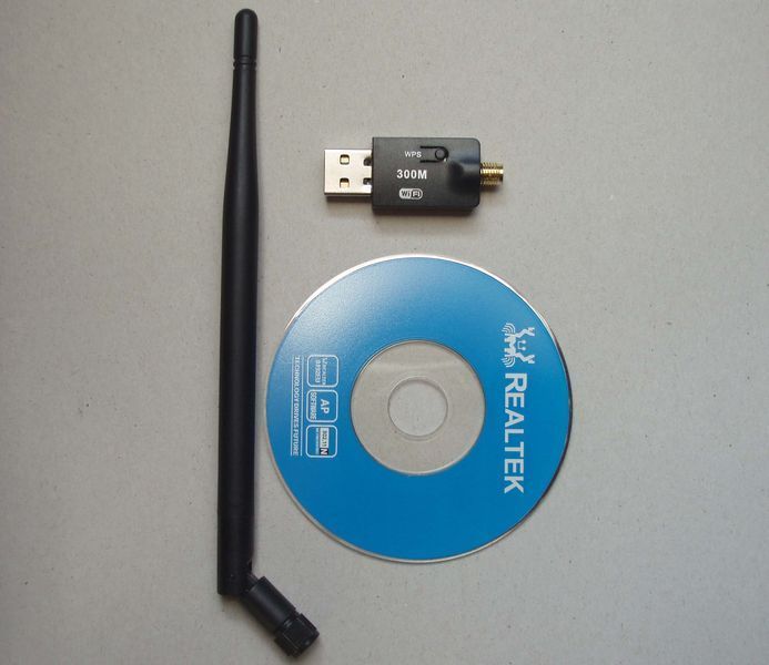 Беспроводной сетевой USB WI-FI адаптер Realtek 8188, скорость до 300 Мбит/с, поворотная антенна, сетевая 1052 фото