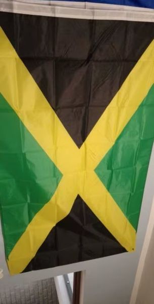 Прапор Ямайки Jamaica "Out of Many, One People" (150*90 см) 100% поліестер із подвійною прошивкою Високоякісний прапор держави Ямайка, розміром 90*150 см. Для приватних і музейних колекцій, експозицій, науково-дослідної та викладачської діяльності. Вигото 8152 фото