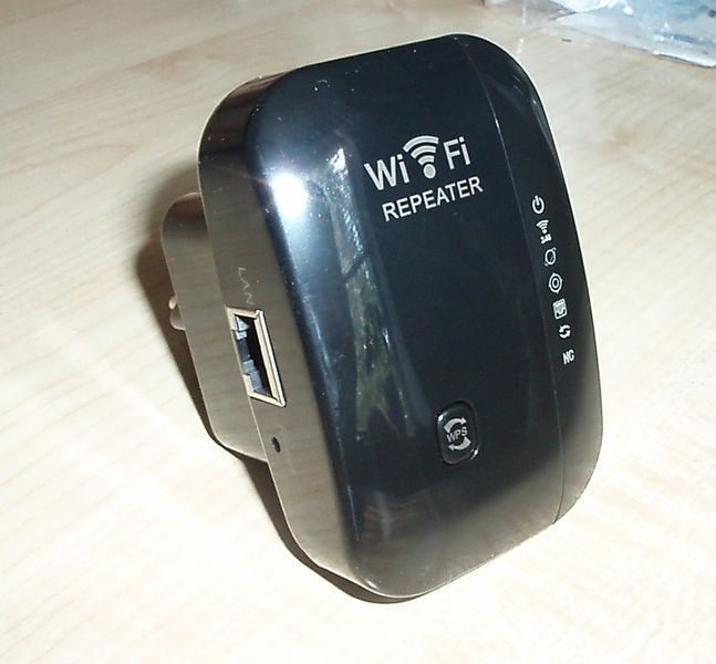 Подовжувач сигналу репітер (білий) 300Mbps Wireless Wi-Fi Repeater 2.4G Router Wifi Range Extender 7741 фото